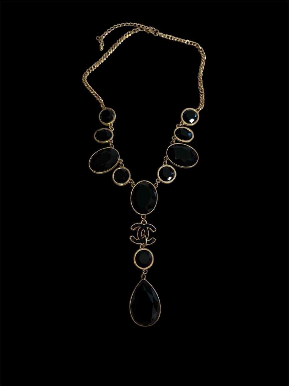Bib Necklace with Black Faceted Drops and Iconic Pendant